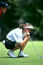 Female Golfer Preparing to Put - Photo : NSIC Collection 